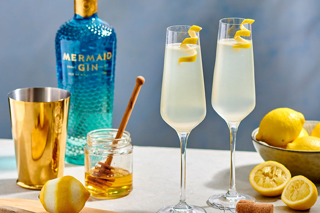 French 75 Cocktail with Mermaid Gin and a Twist of Lemon