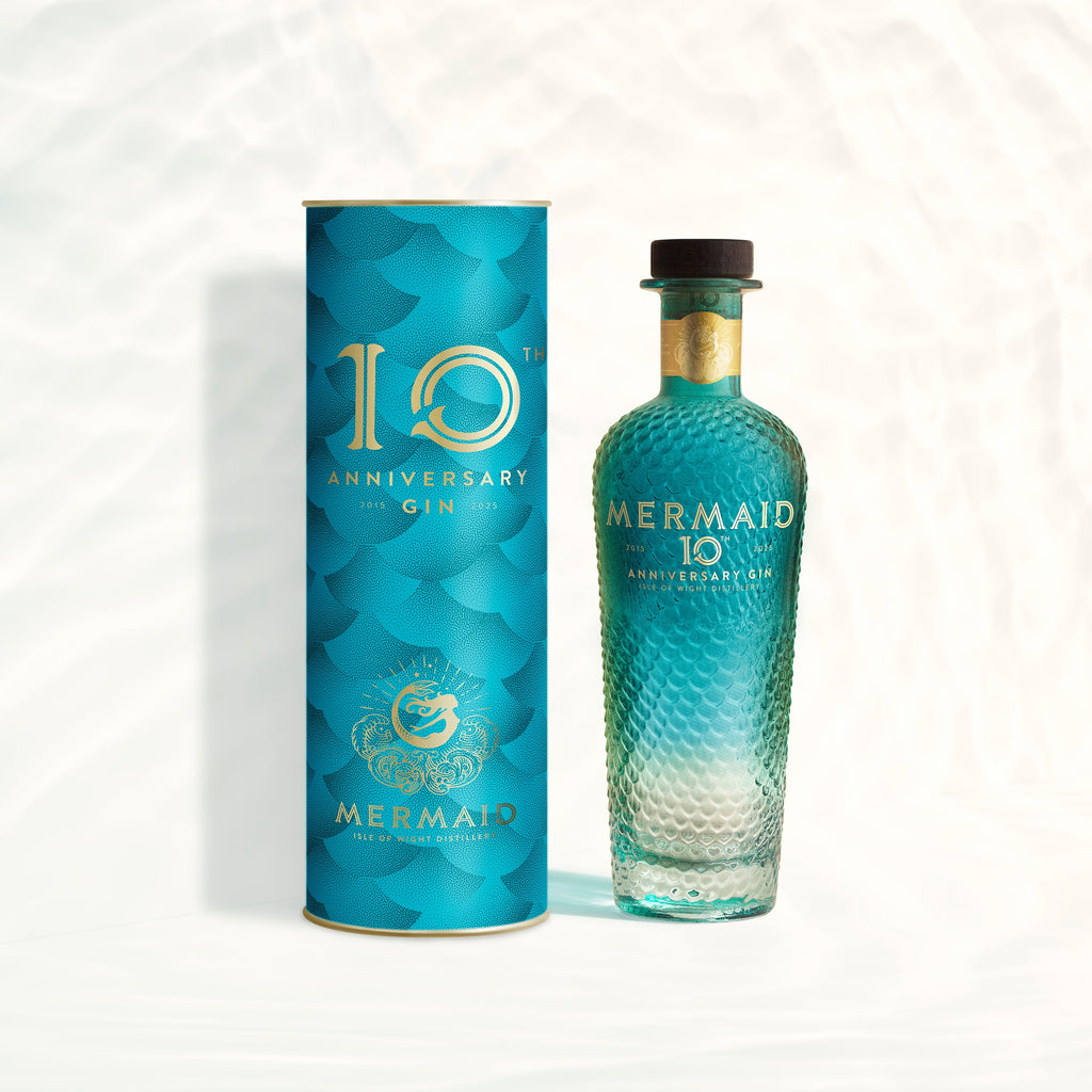 Mermaid 10th Anniversary Gin bottle and packaging on a white background